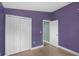 Bedroom with double door closet and wood flooring at 752 Hunt Dr, Lake Wales, FL 33853