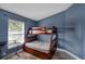 Bedroom with bunk bed and desk workspace at 752 Hunt Dr, Lake Wales, FL 33853