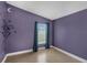 Bedroom with wood flooring and star-themed wall at 752 Hunt Dr, Lake Wales, FL 33853