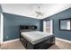 Main bedroom with ceiling fan and large bed at 752 Hunt Dr, Lake Wales, FL 33853