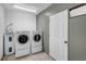 Laundry room with washer, dryer, and storage at 752 Hunt Dr, Lake Wales, FL 33853