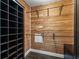 Well-organized closet space with wooden shelves and hanging rods for efficient storage at 3808 Gaines Dr, Winter Haven, FL 33884