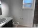 Clean bathroom with modern vanity and a bathtub at 833 3Rd Ave, Waverly, FL 33877