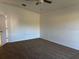 Bright and airy bedroom with carpet flooring and ceiling fan at 833 3Rd Ave, Waverly, FL 33877