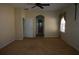 Large bedroom with plush carpeting and ceiling fan at 3832 Traditions N Blvd, Winter Haven, FL 33884