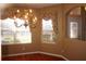 Bright dining room with hardwood floors and large windows at 3832 Traditions N Blvd, Winter Haven, FL 33884