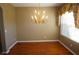 Formal dining room with hardwood floors and a chandelier at 3832 Traditions N Blvd, Winter Haven, FL 33884