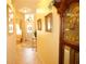 Bright and spacious entryway with tile flooring and decorative elements at 3832 Traditions N Blvd, Winter Haven, FL 33884