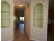 Hallway with built-in shelves and tiled flooring at 3832 Traditions N Blvd, Winter Haven, FL 33884