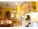 Bright kitchen with wood cabinets, granite counters, and breakfast nook at 3832 Traditions N Blvd, Winter Haven, FL 33884