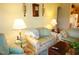Cozy living room with floral sofas and a coffee table at 3832 Traditions N Blvd, Winter Haven, FL 33884