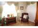 Bright home office features built-in shelving and comfortable seating at 3832 Traditions N Blvd, Winter Haven, FL 33884