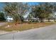 Single story home with a yard and street view at 605 Florida Ave, Dundee, FL 33838