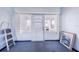 Small room with a door to the outdoors and a framed picture at 605 Florida Ave, Dundee, FL 33838