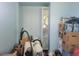 Unfinished room with storage boxes and cleaning supplies at 2418 W 1St St, Sanford, FL 32771