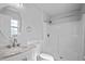Bathroom featuring white vanity with marble counter and a shower with a tub at 720 S Morrison Ave, Fort Meade, FL 33841