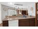 Kitchen boasts double sink, dishwasher, and modern pendant lighting at 524 Coleman W Dr, Winter Haven, FL 33884