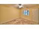 Bedroom with tile flooring, neutral walls, ceiling fan and exterior window with blinds at 579 Saint Andrews Rd, Winter Haven, FL 33884