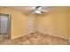 Neutral bedroom with ceiling fan and decorative tile flooring at 579 Saint Andrews Rd, Winter Haven, FL 33884