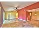 Spacious living room featuring neutral tile floors and unique design elements at 579 Saint Andrews Rd, Winter Haven, FL 33884