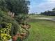 Picturesque golf course view with well-maintained greens and vibrant landscaping at 6001 Country Club Dr, Lake Wales, FL 33898