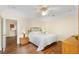 Comfortable bedroom with a queen-sized bed and modern bedside tables and lamps at 627 Watercrest Dr, Haines City, FL 33844