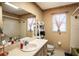 Bathroom featuring a single sink, storage shelf, and shower with a curtain at 672 Wakulla Dr, Winter Haven, FL 33884