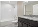 Updated bathroom includes new vanity, subway tile and granite counters at 221 Avenue P Nw, Winter Haven, FL 33881