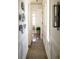 Bright hallway featuring wainscoting, hardwood floors and natural light streaming in at 2300 Scenic N Hwy # 51, Lake Wales, FL 33898
