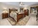 Inviting bedroom with a large bed, warm lighting, and stylish furnishings at 4189 Limerick Dr, Lake Wales, FL 33859