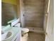 Updated bathroom featuring a tiled shower and modern fixtures at 123 Osprey Heights Dr, Winter Haven, FL 33880