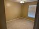 Neutral bedroom with a window and a ceiling fan at 123 Osprey Heights Dr, Winter Haven, FL 33880