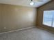 Neutral bedroom with a window and a ceiling fan at 123 Osprey Heights Dr, Winter Haven, FL 33880