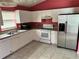 This spacious kitchen features stainless steel appliances and ample cabinet space at 123 Osprey Heights Dr, Winter Haven, FL 33880