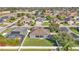 Neighborhood aerial view displaying a home, fenced backyard, pool, and well-kept landscaping at 2821 Sheldon St, Lakeland, FL 33813