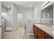 Bright bathroom with a glass shower and a single sink vanity at 2821 Sheldon St, Lakeland, FL 33813