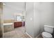 Bright bathroom with a tub, double sink vanity, and toilet at 2821 Sheldon St, Lakeland, FL 33813