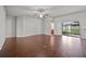 Bright living room with wood floors and sliding glass doors to the outdoor area at 2821 Sheldon St, Lakeland, FL 33813