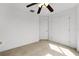 Bright bedroom featuring a neutral carpet and a large closet at 4071 Albritton Rd, St Cloud, FL 34772