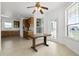 Bright dining area open to kitchen featuring a ceiling fan and lots of natural light at 4071 Albritton Rd, St Cloud, FL 34772