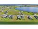 Aerial view showcasing lakefront homesites in a tranquil community at 473 Adams View Ln, Auburndale, FL 33823