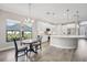 Kitchen breakfast nook with wood table and view to backyard at 473 Adams View Ln, Auburndale, FL 33823