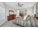 Spacious main bedroom with king bed and ensuite bathroom access at 473 Adams View Ln, Auburndale, FL 33823