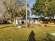 Charming home featuring a well-manicured front yard and inviting entrance at 2002 Sutton Rd, Lakeland, FL 33810