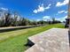 Well-maintained backyard offering scenic water views at 222 Cattail Way, Lake Alfred, FL 33850