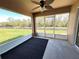 Enclosed patio featuring outdoor space with great nature views at 222 Cattail Way, Lake Alfred, FL 33850