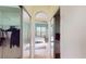 Bedroom with mirrored closets and access to another room at 235 Foggy Creek Rd, Davenport, FL 33837