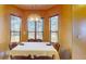 Bright dining area with large windows and chandelier at 235 Foggy Creek Rd, Davenport, FL 33837