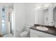 Bright bathroom with shower, sink and natural light from the window at 324 Hamilton Shores Ne Dr, Winter Haven, FL 33881