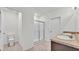 Bathroom with double sinks, shower and toilet at 935 Waterville Dr, Auburndale, FL 33823